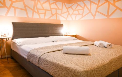 Ліжко або ліжка в номері Exclusive Apartment Schönbrunn