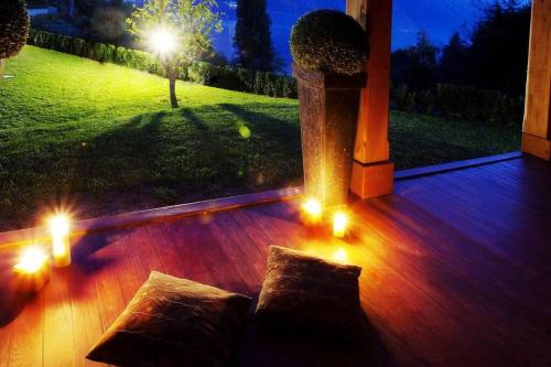 a view of a porch with lights on the floor at Tremezzo Residence 3-1 of 11 apartments in an exclusive residence by Italian Apartments in Tremezzo