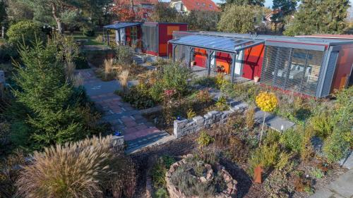 an aerial view of a garden with a house at mein kleinHOTEL in Herbstein