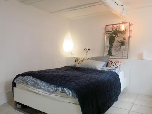 Säng eller sängar i ett rum på ApartmentInCopenhagen Apartment 1267