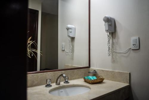 Ванная комната в Hotel Ciudad
