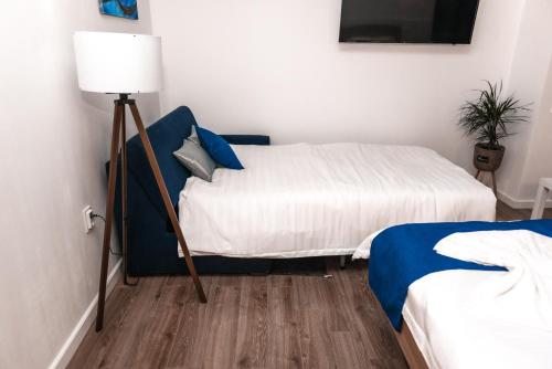 Cama o camas de una habitación en Puzzle Apartaments&Studios