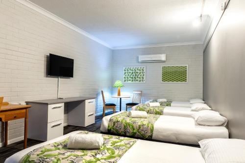 Postel nebo postele na pokoji v ubytování Country Motel Ipswich