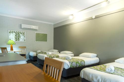 Postel nebo postele na pokoji v ubytování Country Motel Ipswich