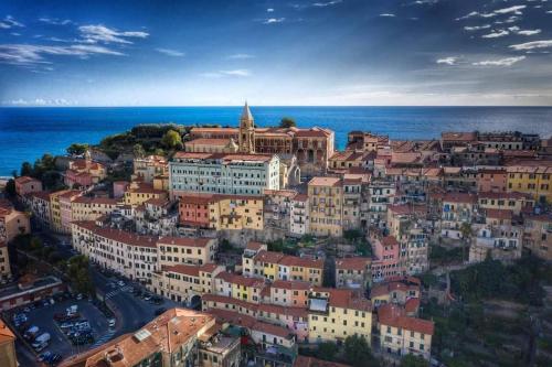 an aerial view of a city with the ocean at Tuffonelblu in Ventimiglia