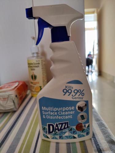a spray bottle ofmidnight proof surface cleaner and dispenser at Judges Court in Puri