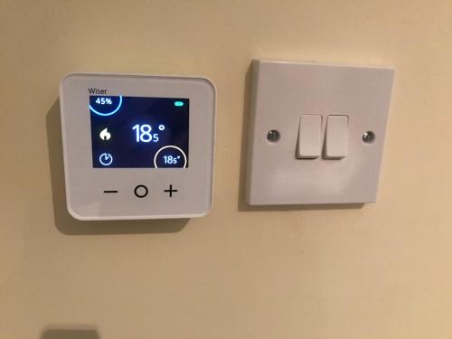 a lightswitch on a wall in a room at Studio-1-Staines/Heathrow/London-own entrance in Staines
