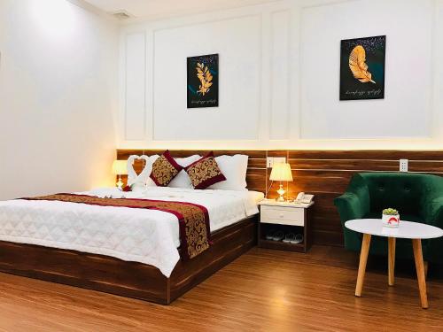 Giường trong phòng chung tại NEW CITY HOTEL