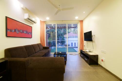 Μια τηλεόραση ή/και κέντρο ψυχαγωγίας στο Eternal Wave Apartments by Daystar Ventures