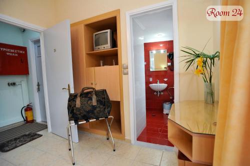 Koupelna v ubytování Apollon Hotel