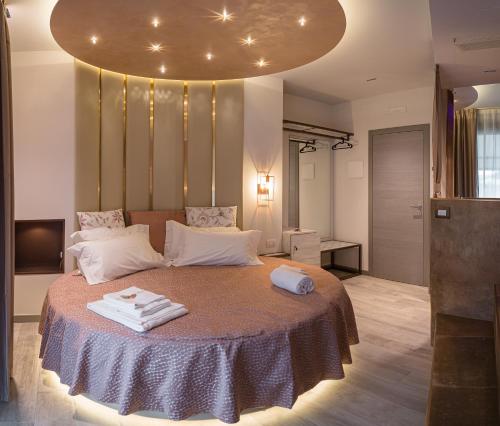 Postel nebo postele na pokoji v ubytování Beautiful Assisi Suite