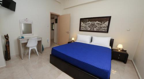Posteľ alebo postele v izbe v ubytovaní Chrysiida Apartment