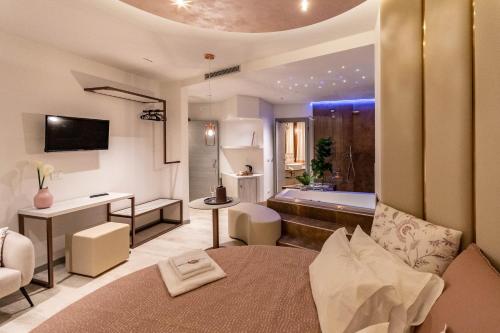 Camera con letto e bagno con vasca. di Beautiful Assisi Suite ad Assisi