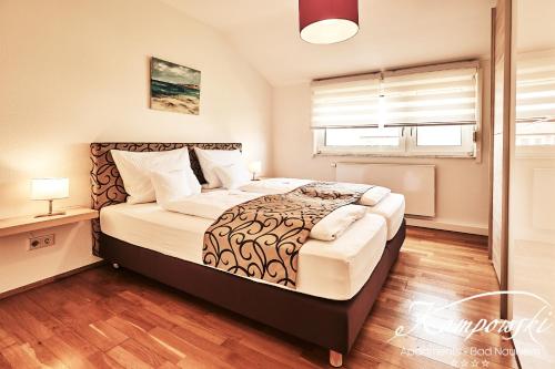 Ένα ή περισσότερα κρεβάτια σε δωμάτιο στο Kampowski Apartments Bad Nauheim
