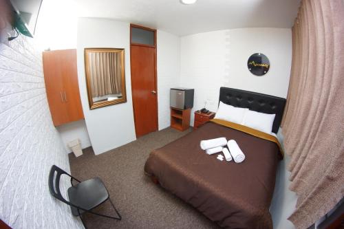 Un pat sau paturi într-o cameră la Marcanay