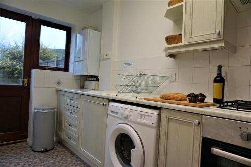 Kuchyň nebo kuchyňský kout v ubytování Palmers Apartment A