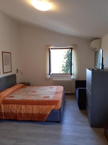 Ένα ή περισσότερα κρεβάτια σε δωμάτιο στο Residence Le Palme appartamenti