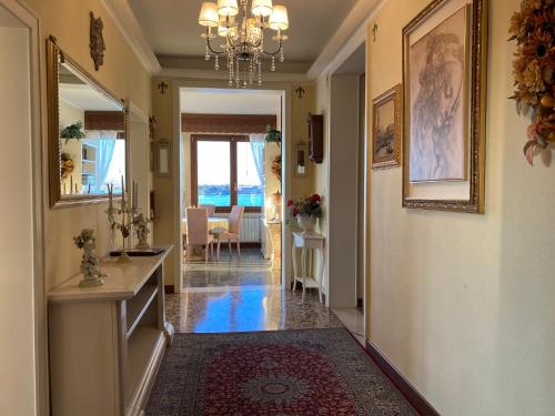 a hallway of a home with a chandelier at OASIS Golden Lagoon Chalet in Venice-Lido