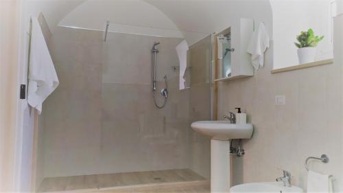 a bathroom with a shower and a sink at Dimora storica a Canosa di Puglia in Canosa di Puglia