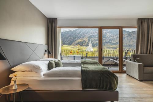 Maraias - Luxury Suites & Apartmentsにあるベッド