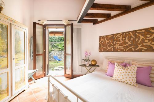 Postel nebo postele na pokoji v ubytování Casina di Dario - Pet Friendly