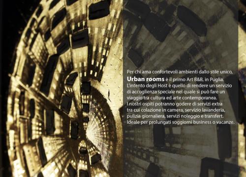 un cartel de un museo con una foto de un edificio en Urban Rooms, en Taranto