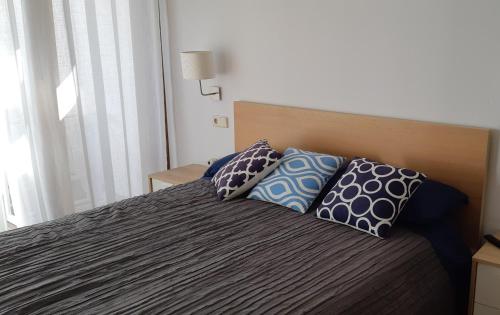 Katil atau katil-katil dalam bilik di apartamento Xeresa del monte Resort