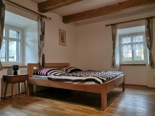 Postel nebo postele na pokoji v ubytování Chalupa U Potoka