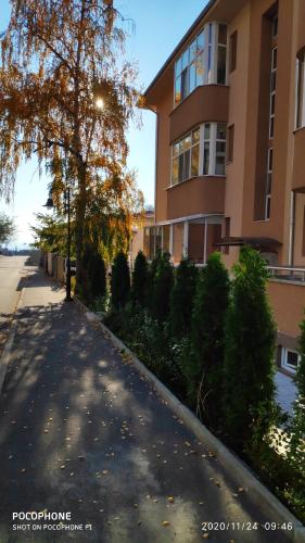 an empty street in front of a building at UNIQUE LOCATION APARTMENT WITH PARKING in Burgas City