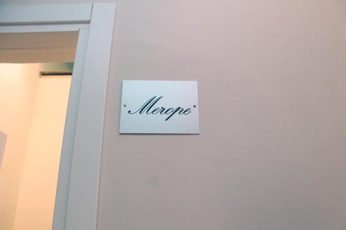 a sign on a door with the word imagine on it at HOTEL VILLA ISA in Pescara