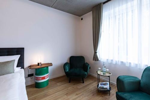 Χώρος καθιστικού στο LÜTTES LOFT Boutique Hotel
