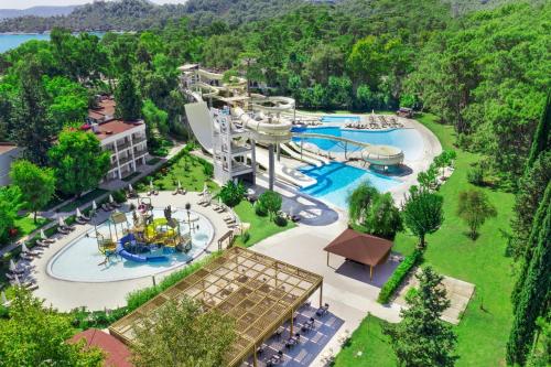 an aerial view of a resort with a water park at Sherwood Exclusive Kemer - Kids Concept in Kemer