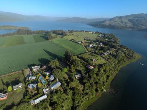 an island in the middle of a lake at Complejo Pehuen Lago Lanalhue in Cañete