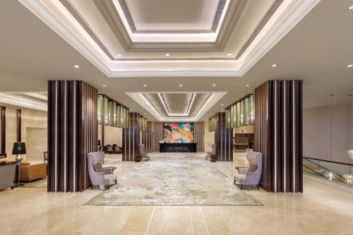Area soggiorno di Pride Plaza Hotel, Aerocity New Delhi