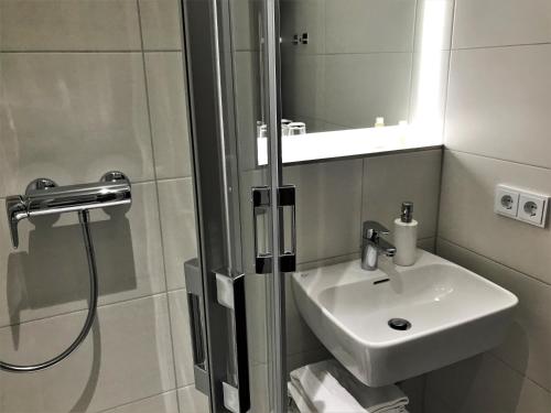 Flair-Hotel Waldfriedenにあるバスルーム