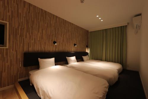 En eller flere senge i et værelse på 5 minutes Shin-Osaka 9