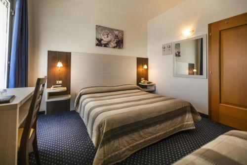 Hotel Al Molinoにあるベッド