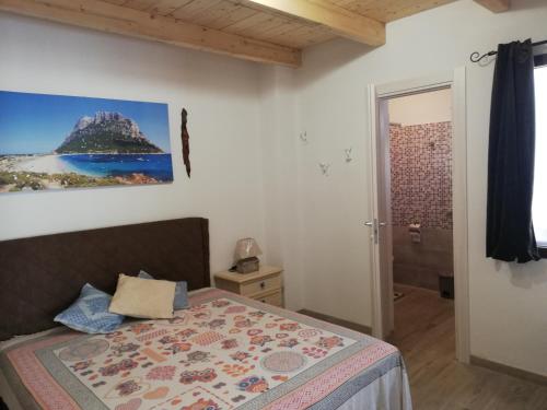 En eller flere senge i et værelse på Casa Tommy