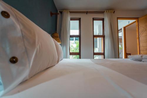 Ένα ή περισσότερα κρεβάτια σε δωμάτιο στο Muguet House Granada