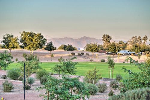 a park with trees and grass and mountains in the background at Backyard Oasis Updated San Tan Valley Escape in San Tan Valley