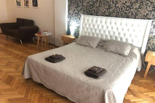 Best Location in Palermo-Buenos Aires 51m2 tesisinde bir odada yatak veya yataklar