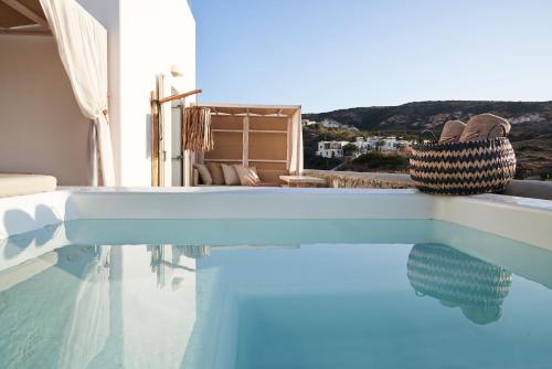 The swimming pool at or close to Volcano Luxury Suites Milos - Adults Only