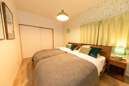Katil atau katil-katil dalam bilik di Serendipity Koiwa - Vacation STAY 11031v