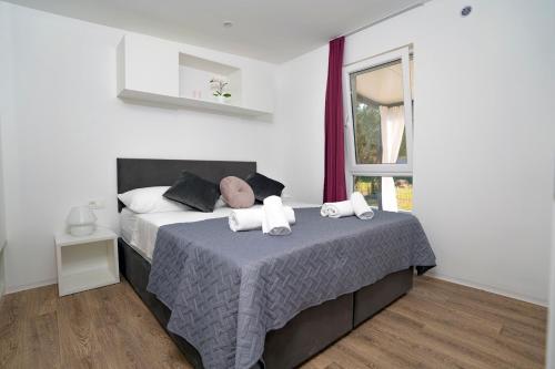 Postel nebo postele na pokoji v ubytování Adriatic Mobile Homes