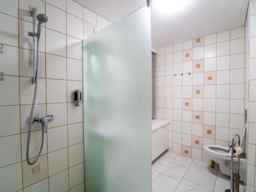 Kúpeľňa v ubytovaní Šarkutė