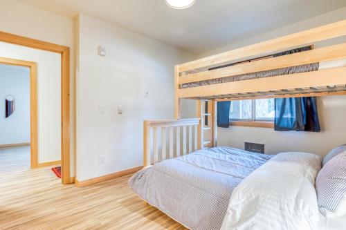 a bedroom with a bunk bed and a window at Golden Poles Chalet #110 in Government Camp