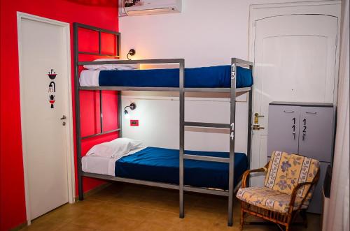 Postel nebo postele na pokoji v ubytování Antonieta Hostel