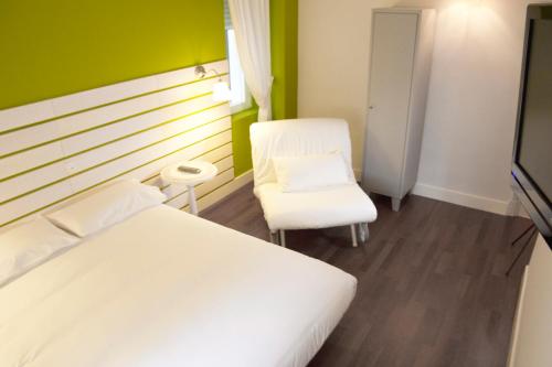 Katil atau katil-katil dalam bilik di Hostal Boreal Mistral