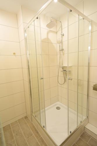 Ένα μπάνιο στο Mainzimmer - Business Apartments