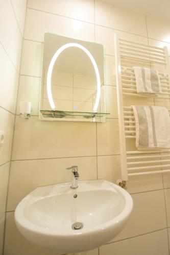 Ένα μπάνιο στο Mainzimmer - Business Apartments